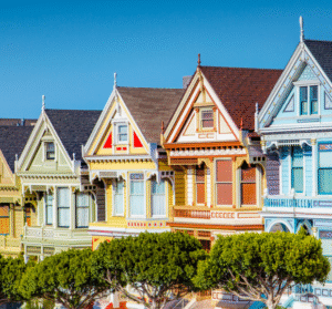 Row of colorful Victorian houses on a hill in San Francisco