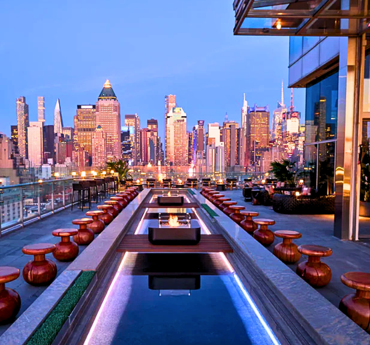 Bright NYC skyline from rooftop hotel