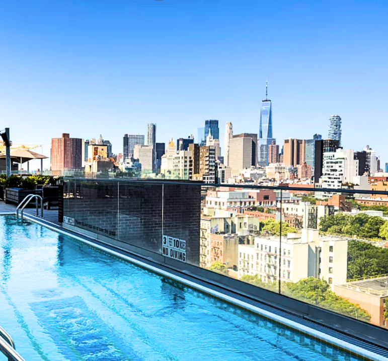 Hotel Indigo pool overlooking the NYC skyline