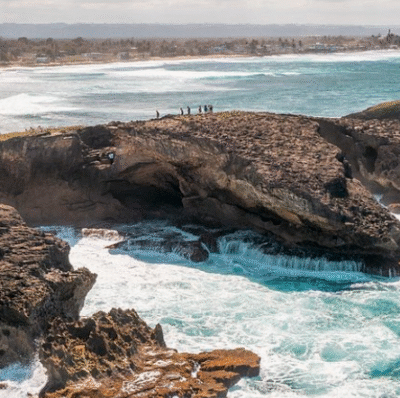 Group of travelers on a guided boat tour along the San Juan coastline with ocean views