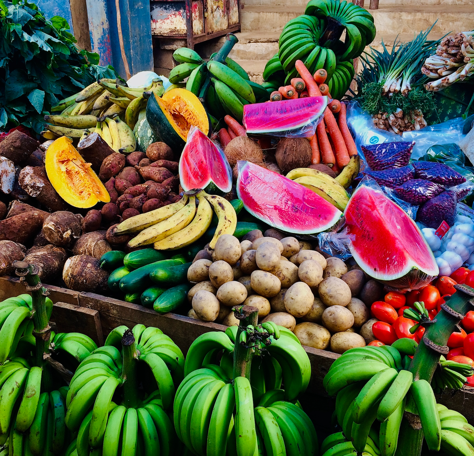 Fresh tropical fruits displayed at a local Jamaican market stall