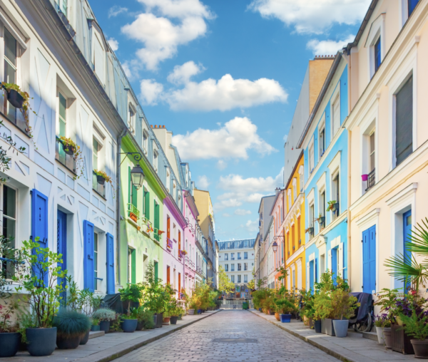 Paris vibrant streets with greenery and blue skies