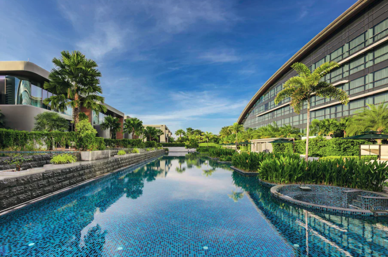 Dusit Thani Laguna Singapore resort surrounded by lush greenery and golf course