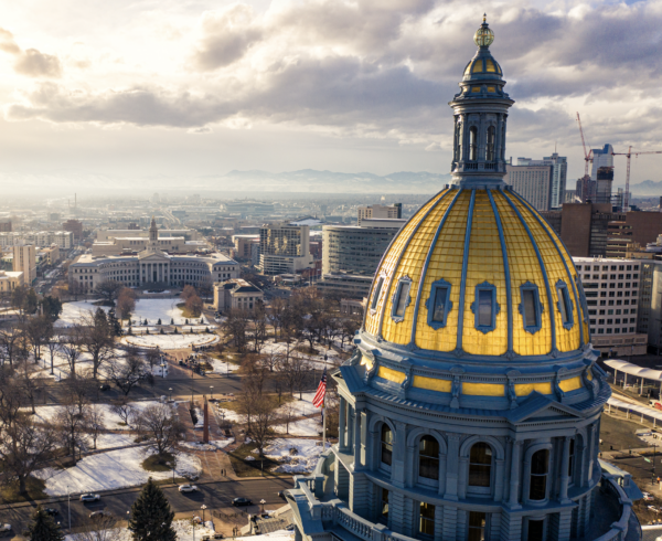 Gold-topped building shining in sunlight