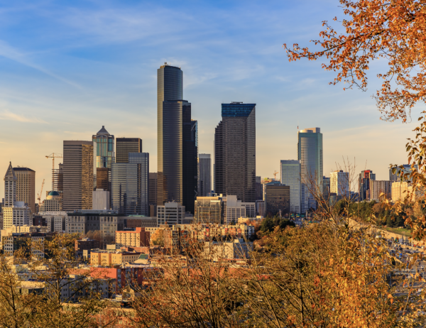 Seattle skyline during the day with a mix of skyscrapers and waterfront views
