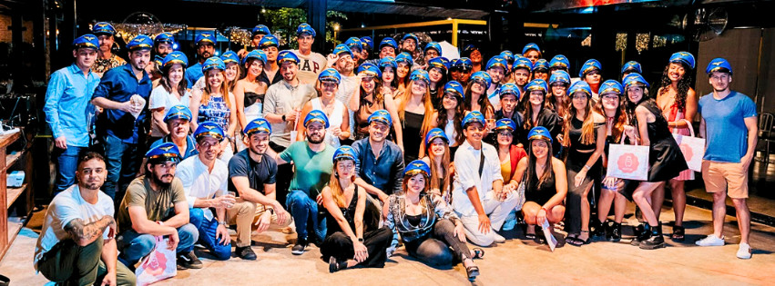 Untitled Design 22 3 Group of ID90 Travel employees gathered together at the Argentina office location